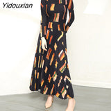 Yidouxian 2023 New Miyake Pleated Fashion Loose Meat Covering Top Pleated Half Skirt Set Two Piece Elegant Women's Clothing